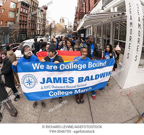 College bound students from the NYC Outward Bound James Baldwin School, cheered on by their classmates, march to the Old Chelsea Post Office in New York on...