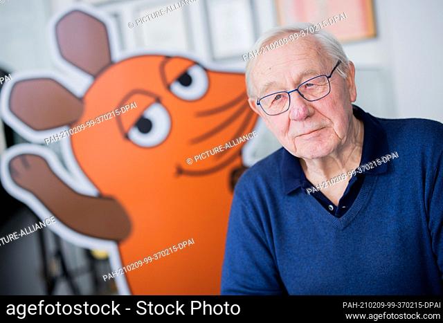 09 February 2021, North Rhine-Westphalia, Cologne: Armin Maiwald, filmmaker, author and co-inventor of the ""Sendung mit der Maus"" is sitting in the foyer of...