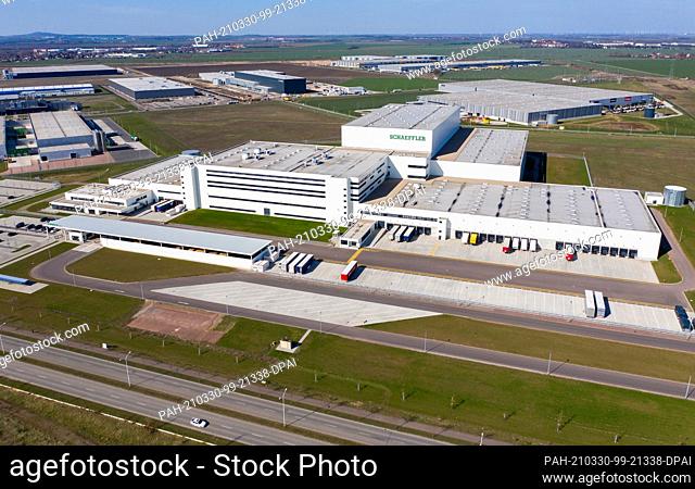 29 March 2021, Saxony-Anhalt, Halle: The production halls of Schaeffler are adjoined by the halls of the other companies in Star Park on the A14 motorway