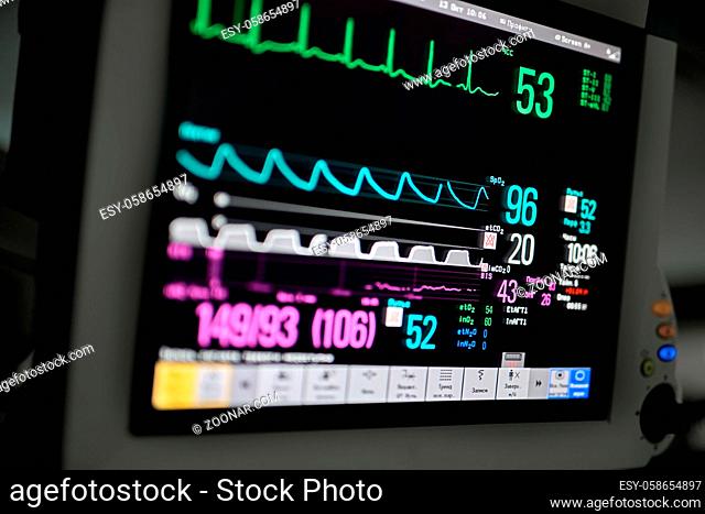 Closeup photo of an EKG monitor. Horizontal