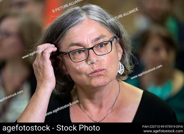 10 July 2022, Saxony, Dresden: Eva Jähnigen, Green Party candidate for mayor, stands at the election party of Bündnis 90/Die Grünen in the Robotron canteen