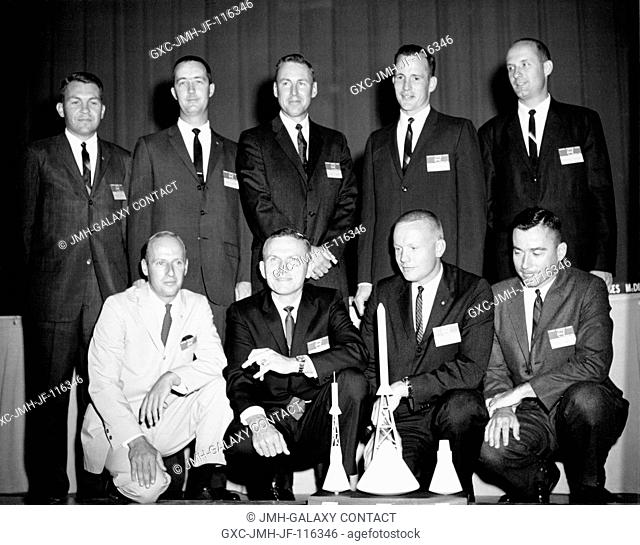New National Aeronautics and Space Administration (NASA) Manned Spacecraft Center (MSC) flight crew personnel. Kneeling (left to right) are astronauts Charles...