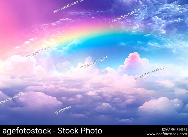 Dynamic sky background with a rainbow arching across the clouds