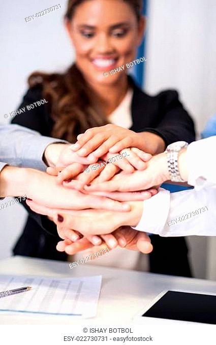 Business team stacking hands