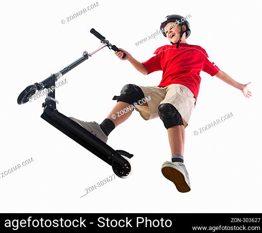 Furious boy with his scooter. Unusual angle view - directly below