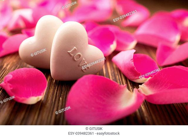 Rose petals and stone hearts