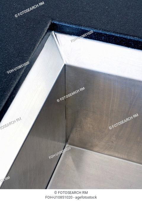 Close-up of underset stainless-steel sink