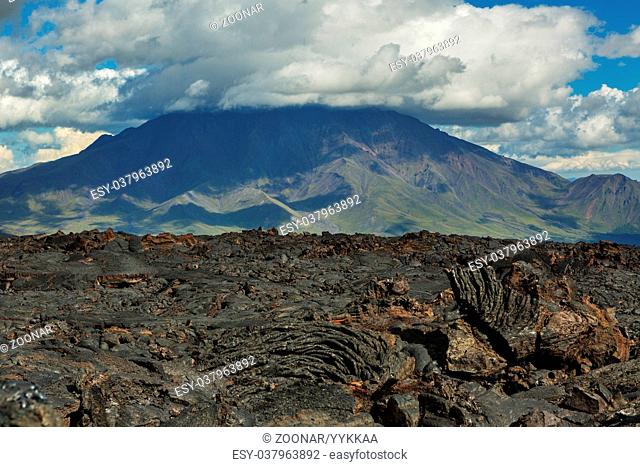 Lava field at Tolbachik volcano, after eruption in 2012 on background Big Udina volcano, Kamchatka