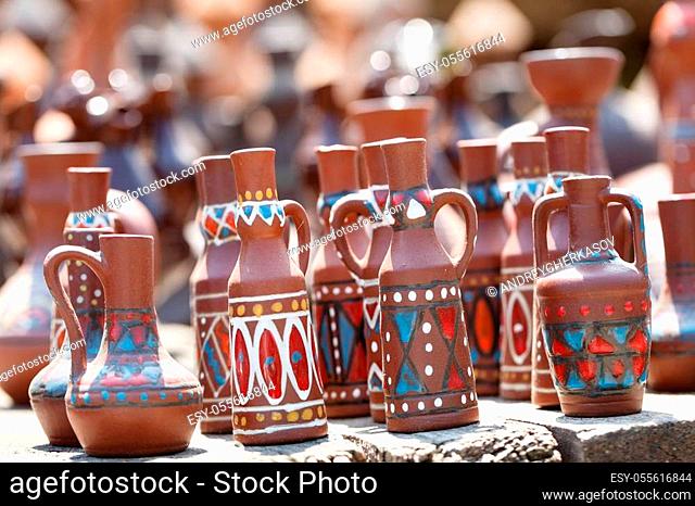 Traditional handmade pottery on display at street market in Tbilisi, Georgia