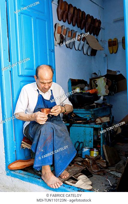 Tunisia - Kairouan - Shoe maker in the souks of the medina