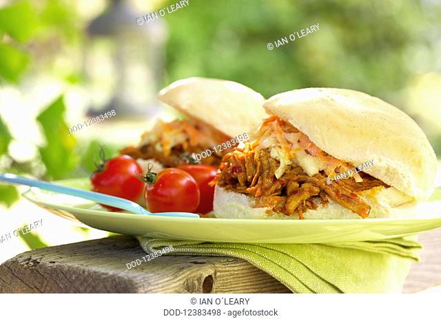 Southern slow-cooked pork with coleslaw in hamburger bun