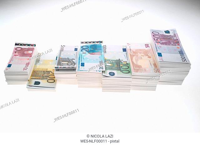 Stack of Euro banknotes, lined up, close up