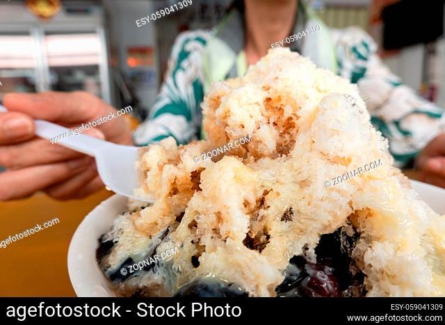 Taiwanese traditional shave ice with mesona black herbal tea