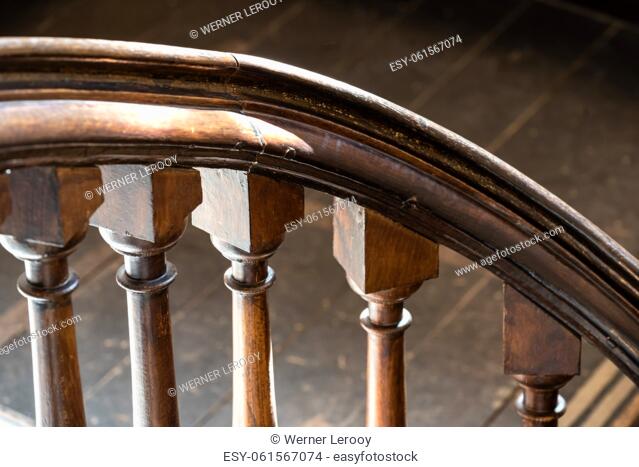 Meise, Flanders - Belgium - Detail of an old worn wooden staircase banister