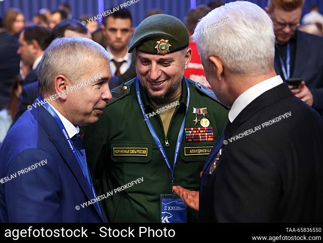 RUSSIA, MOSCOW - DECEMBER 17, 2023: Adviser to the Chechen Republic Head, commander of the special forces unit Akhmat, Apti Alaudinov (C) attends the 21st...