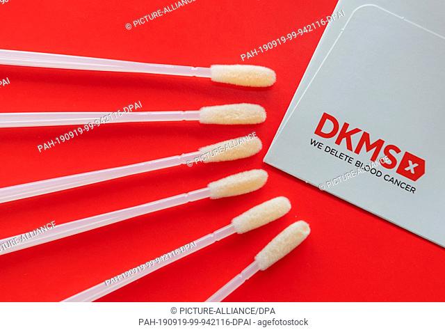 ILLUSTRATION - 18 September 2019, Saxony, Dresden: Medical cotton swabs for the removal of cells from the buccal mucosa can be found on a brochure of the German...