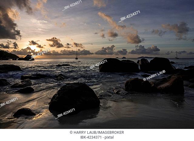 Granite cliffs and beach at Anse Lazio, sunset, evening light, Indian Ocean, Praslin Island, Seychelles