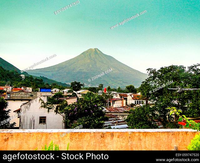 Agua Volcano at dusk from the roof of a home in Antiqua, Guatemala