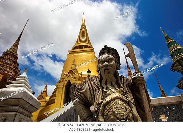 Chinese warrior statue with golden chedi  Wat Phra Kaew Emerald Buddha Temple and Grand Palace  Bangkok, Thailand, Southeast Asia, Asia