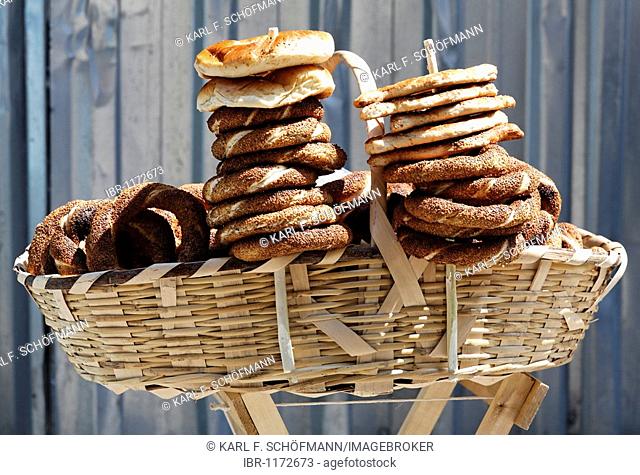 Basket with sesame bread, Simit, street vendors, Istanbul, Turkey
