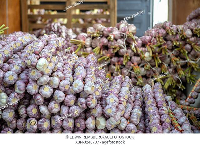 Bunches of garlic (Allium sativum) bulbs lay stacked at the Bronisze Wholesale Market - one of the biggest fruits and vegetables markets in Poland