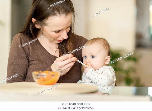 mother feeding baby child, 6 month - 11/02/2016