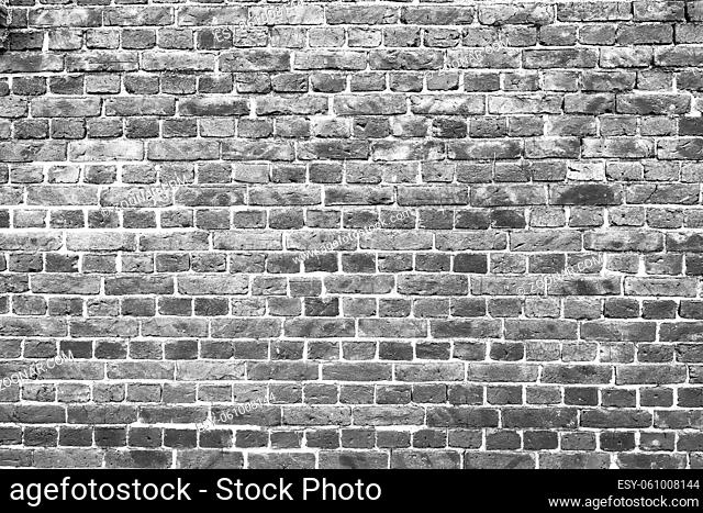 Old worn brick wall exterior pattern texture background