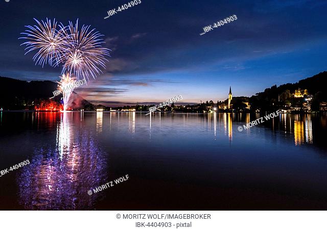 Fireworks, reflection in Lake Schliersee, St. Sixtus Parish Church, Schliersee, Upper Bavaria, Bavaria, Germany