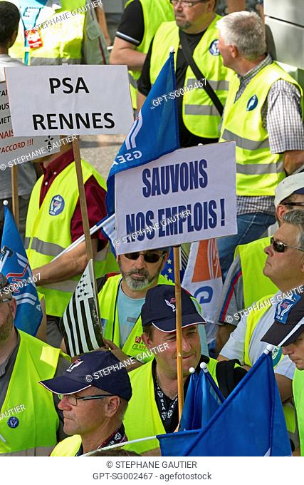 PSA RENNES EMPLOYEES IN FRONT OF THE CORPORATION'S HEADQUARTERS DEMONSTRATING AGAINST THE CLOSING OF THE FACTORY IN AULNAY SOUS BOIS DURING A MEETING OF THE...