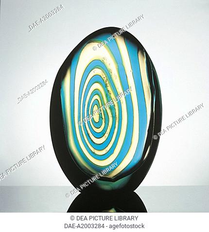 Glassware - Italy - 20th century. Vase. Transparent crystal encases large polychrome concentric circled 'murrina' glass. Designer Flavio Poli
