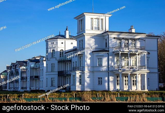 21 February 2021, Mecklenburg-Western Pomerania, Heiligendamm: The ""pearl necklace"" of historic houses in the Baltic Sea resort of Heiligendamm