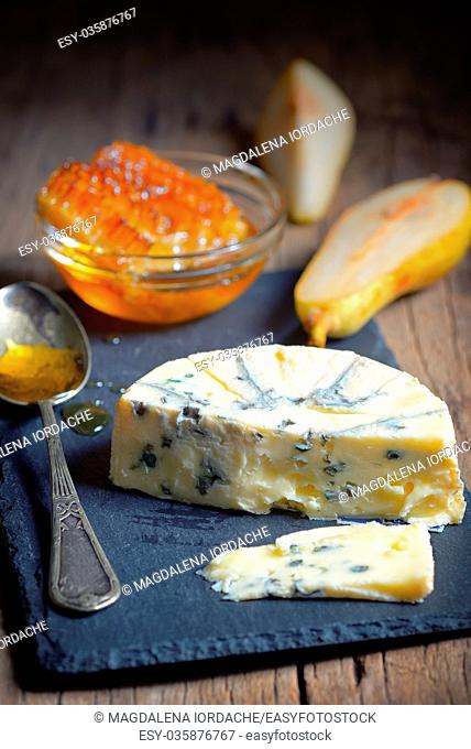 Blue Cheese and honey on ardesia plate