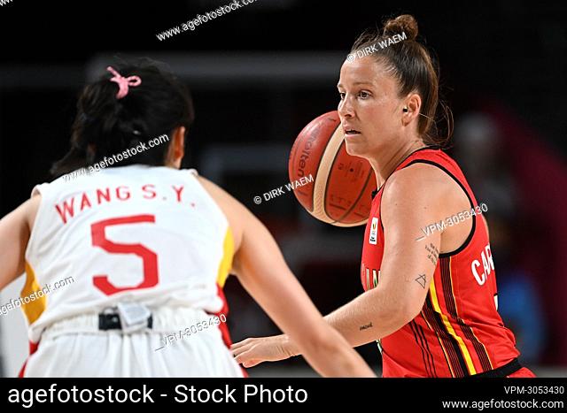 Belgian Cats Marjorie Carpreaux and China's Siyu Wang fight for the ball during a basketball game between Belgium's Belgian Cats and China