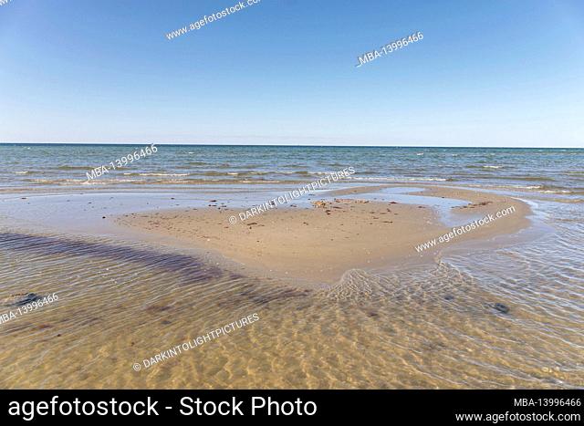 clear sky in spring on the baltic sea beach in laboe, germany