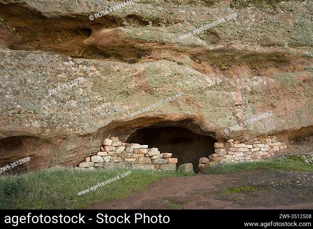 Natural cave with stone fence used by shepherds near Roman city of Tiermes, Centuries I to III A.C., Pela Mountains, Montejo de Tiermes, province of Soria