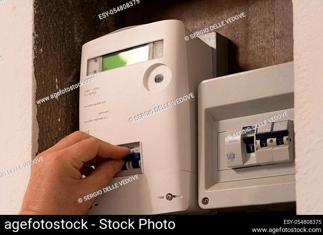 activate the main switch of the electricity in a home