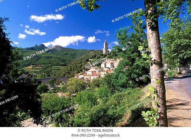View to village on hillside above the Jaur river, Olargues, Herault, Languedoc-Roussillon, France, Europe
