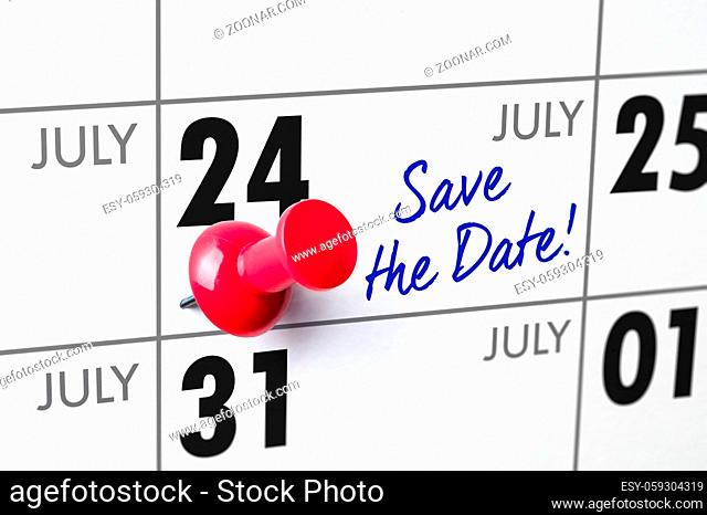 Wall calendar with a red pin - July 24