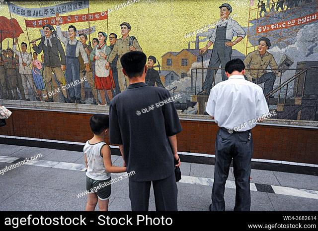 Pyongyang, North Korea, Asia - Waiting passengers on an underground station platform of the Pyongyang Metro in the North Korean capital city