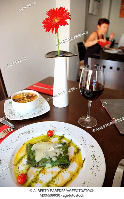 Spinach crêpes and 'salmorejo'  (bread and tomato cold soup) with nuts. El Pecado Restaurant. Jaén. Andalusia, Spain