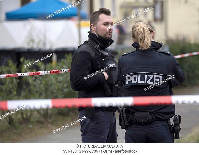 Police officers secure the crime site after an assumed suicide in Darmstadt, Germany, 31 January 2018. After shots were fired in the early morning hours police...