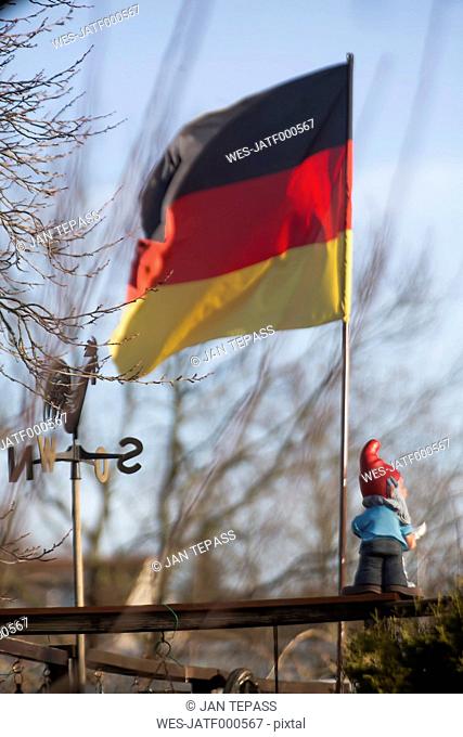 Germany, Cologne, allotment, flag and garden gnome