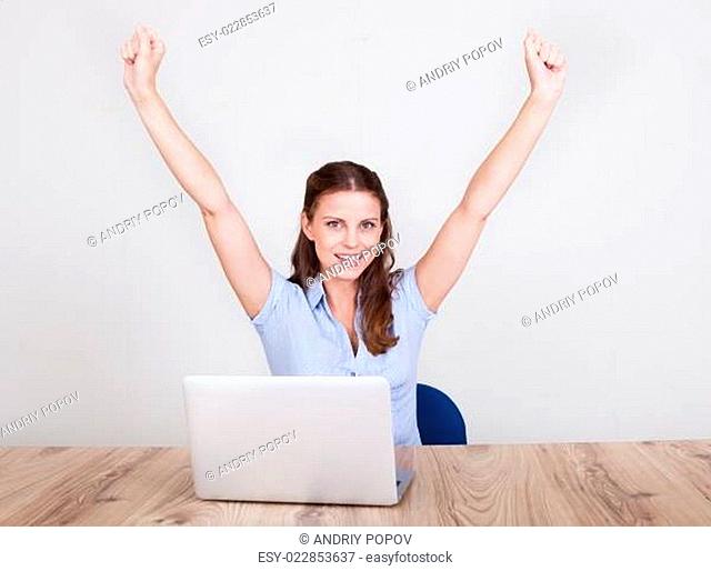 Upbeat successful young woman