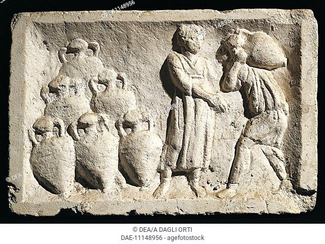 Roman civilization. Relief depicting people carrying amphorae in a wine cellar.  New York, The Metropolitan Museum Of Art