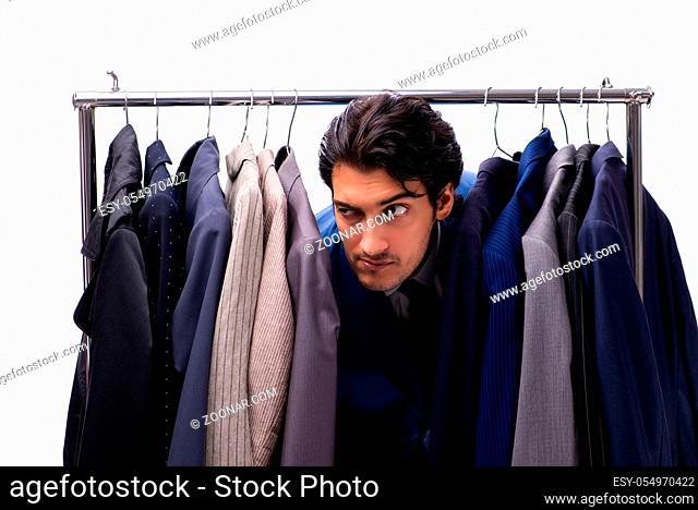 Young handsome businessman in clothing concept