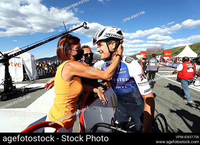 Remco Evenepoel's mother Agna Van Eeckhout celebrate with Belgian Louis Vervaeke of Quick-Step Alpha Vinyl after stage 20 of the 2022 edition of the 'Vuelta a...