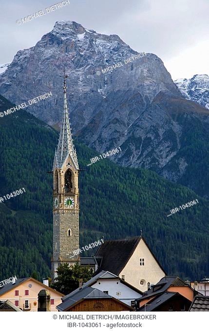 Roofs and church spire of the Reformed Church in front of Piz Lischana, Unterengadin Dolomites, Sent, Lower Engadin, Canton of Graubuenden, Switzerland, Europe