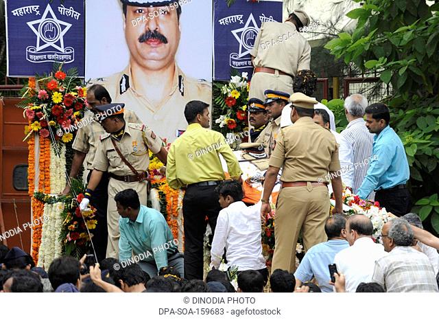 Homage to Chief of Anti Terrorism Squad Hemant Karkare after killed by terrorist attack in Bombay Mumbai ; Maharashtra ; India 26-November-2008 NO MR