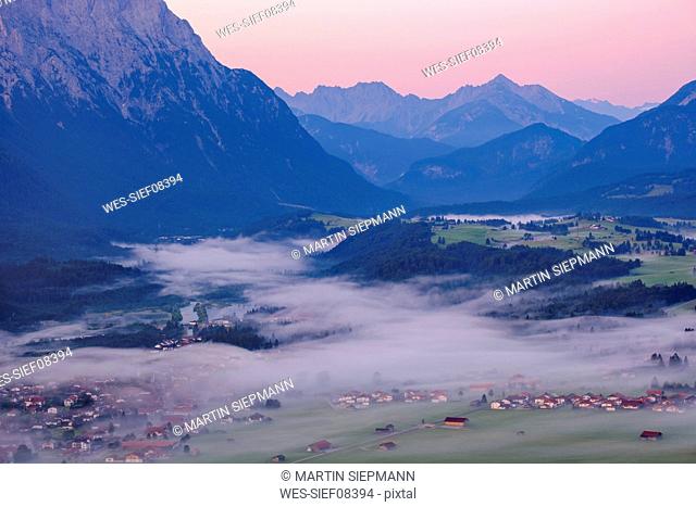 Germany, Upper Bavaria, Werdenfelser Land, Isar Valley and morning fog, view from Krepelschrofen