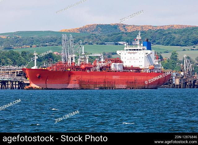 Off shore terminal for North Sea oil with tank ship in Firth of Forth near Scottish Edinburgh
